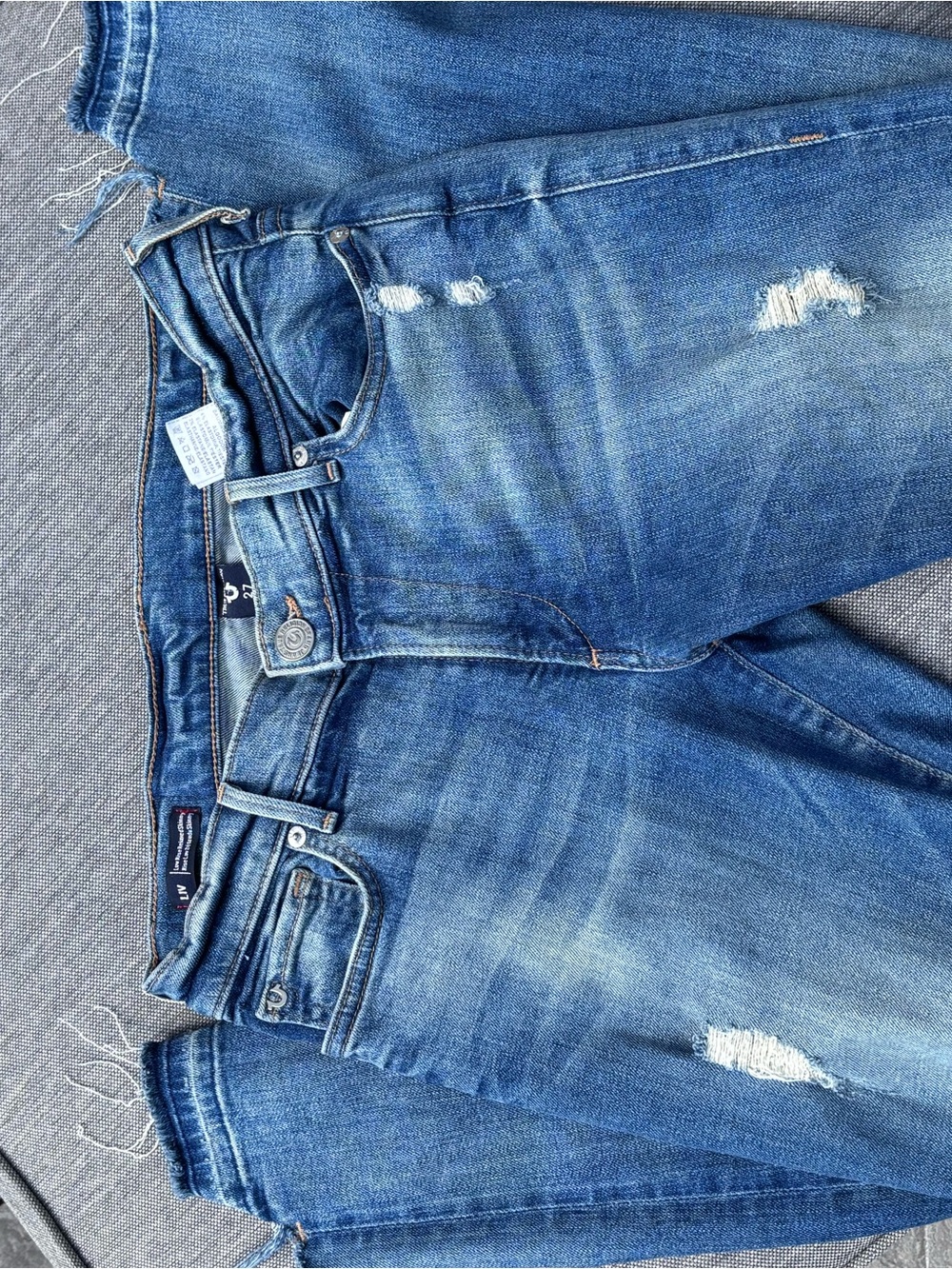 True Religion light blue denim jeans with contrast stitching